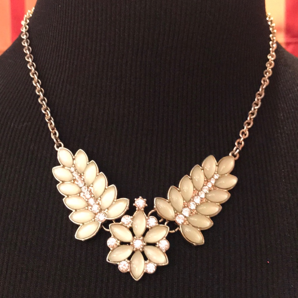 Statement necklace with enamel flower and leaves. Light green.